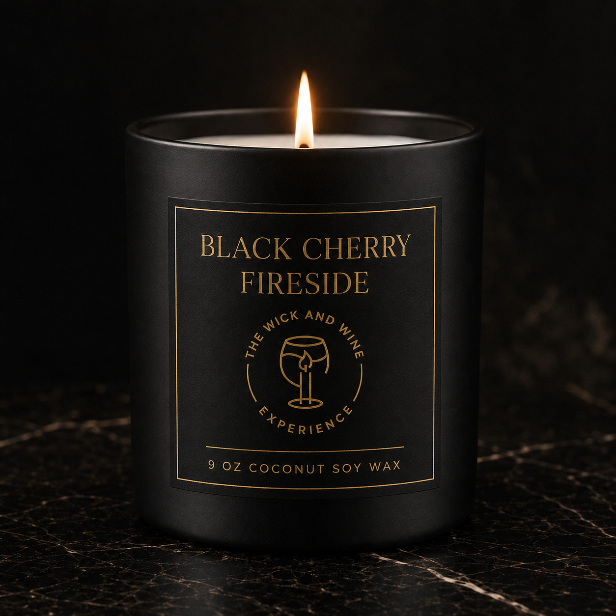 Black Cherry & Fireside 9 oz coconut soy wax candle in matte black jar with gold label