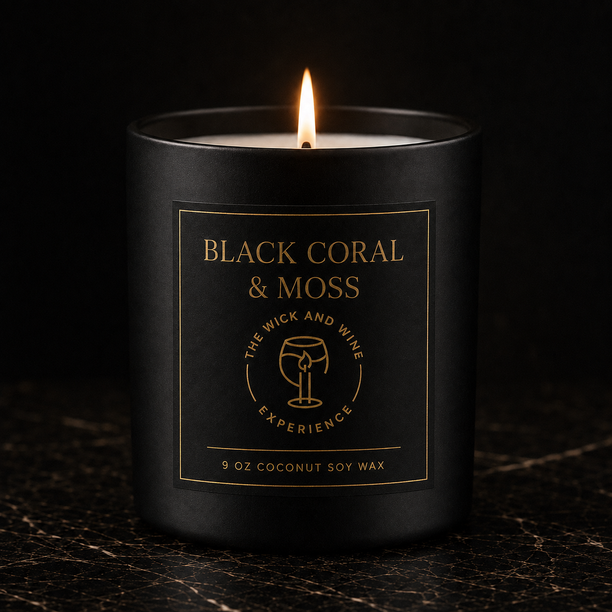 Black Coral & Moss 9 oz coconut soy wax candle in matte black jar with gold label